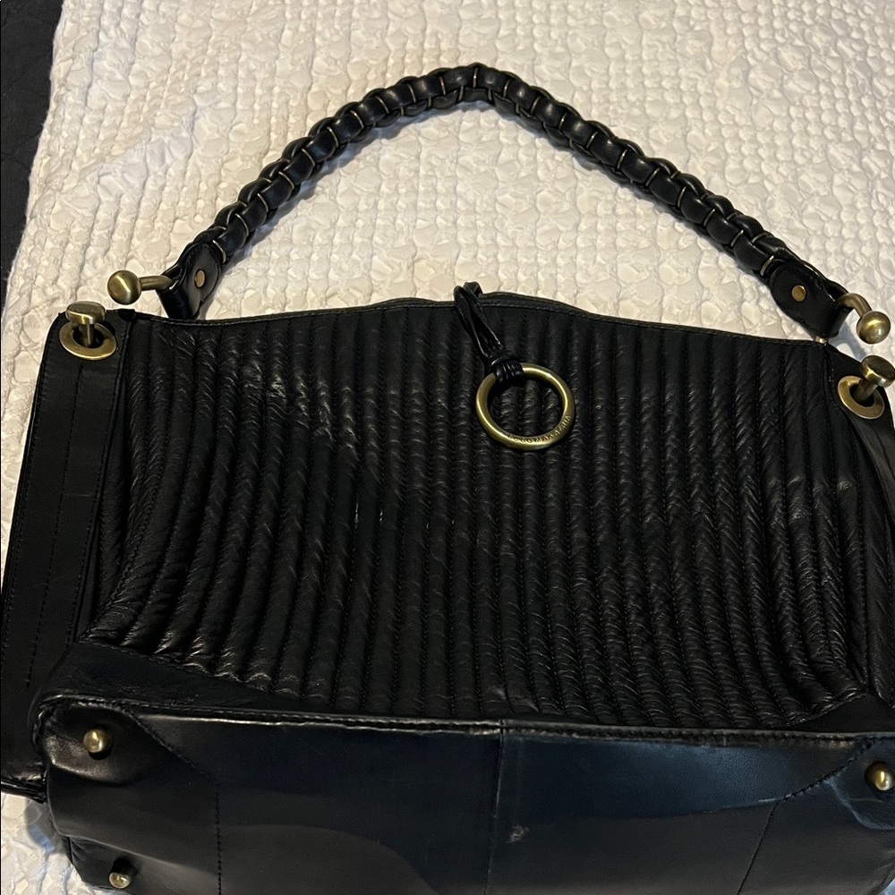 BCBG Max Azaria leather tote. Fabulous brass hardware, maroon fabric interior